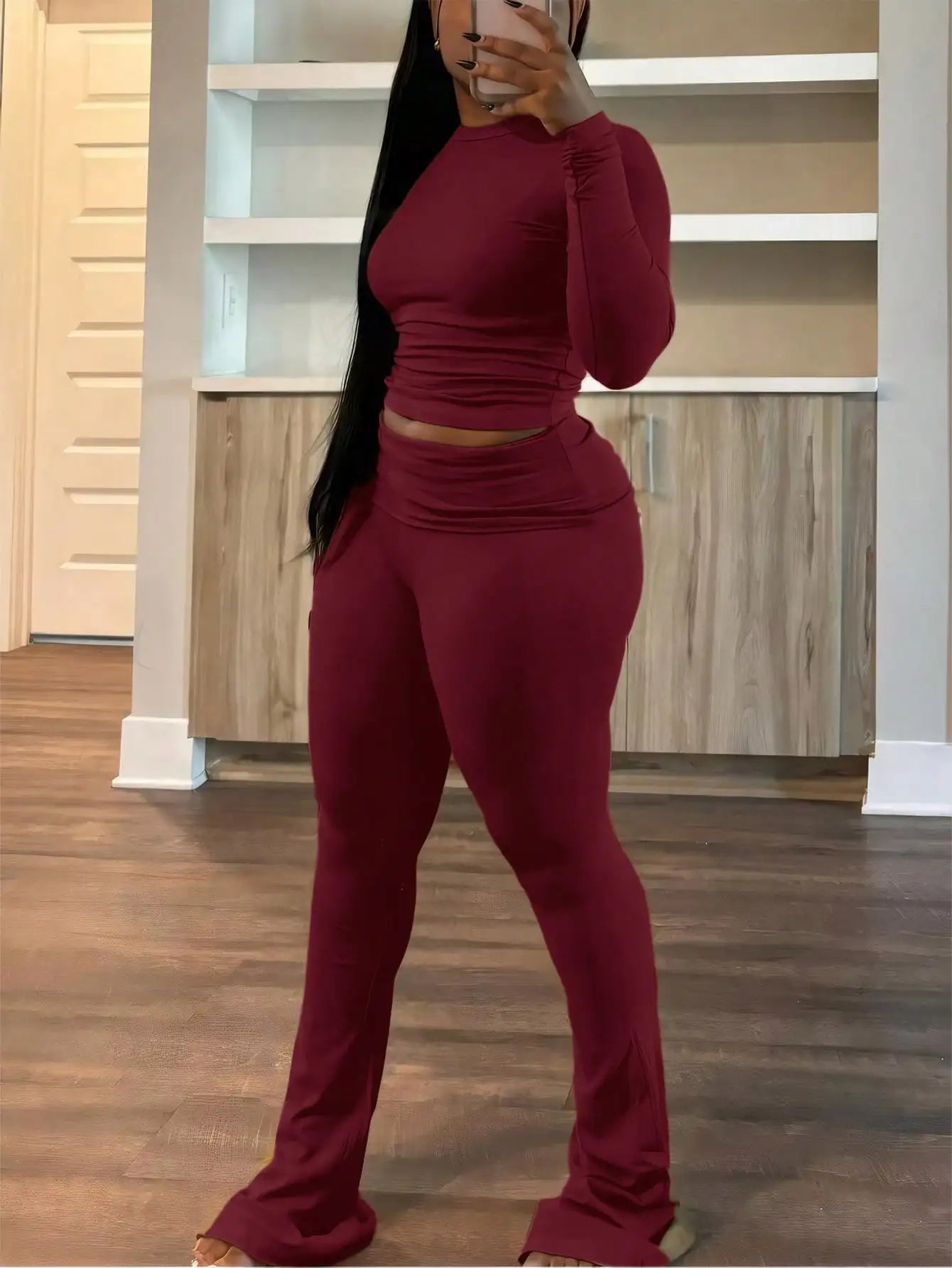 A Wine Red Long-sleeved Crop Top and Flared Pants Collection for Women - A Fashionable and Comfortable Sportswear Set for Ladies